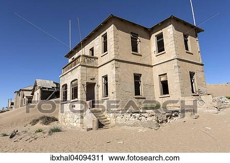 Old houses in the former diamond town, now a ghost town, Kolmanskop, Kolmannskuppe, near Luderitz, Namibia, Africa View Large Photo Image Stock Image - Old houses in the former diamond town, now a ghost town, Kolmanskop, Kolmannskuppe, near Luderitz, Namibia, Africa. Fotosearch