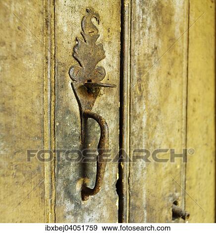 Stock Photo - Old metal door latch and handle. Fotosearch