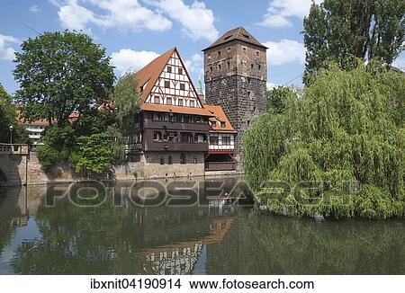 Picture - Old timbered houses and hanging tower, Nuremberg, Middle Franconia, Bavaria, Germany, Europe. Fotosearch