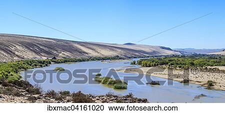 Stock Image - Orange River, the border river between Namibia and South Africa, Namibia, Africa. Fotosearch