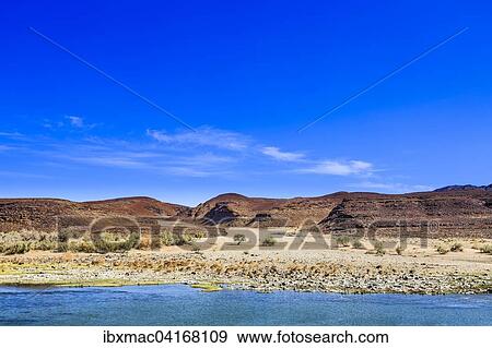 Oranje, the border river between Namibia and South Africa, Namibia, Africa View Large Photo Image Stock Photo - Oranje, the border river between Namibia and South Africa, Namibia, Africa. Fotosearch