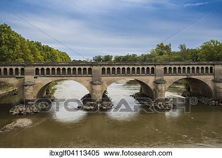 Orb Aqueduct, Canal du Midi spans the river Orb, Beziers, Languedoc-Roussillon, Aude, France, Europe View Large Photo Image Stock Photography - Orb Aqueduct, Canal du Midi spans the river Orb, Beziers, Languedoc-Roussillon, Aude, France, Europe. Fotosearch