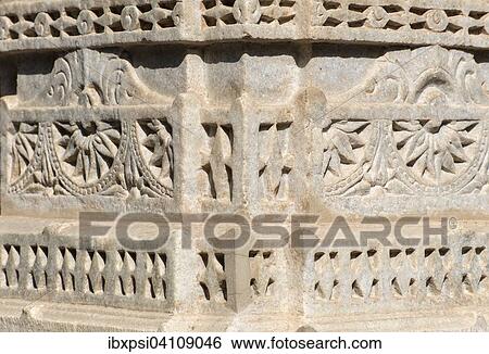 Stock Photograph - Ornate stone carvings at Ranakpur Jain Temple, Rajasthan, India, Asia. Fotosearch