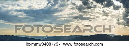 Panorama, dramatic clouds and silhouette of hills, twilight, Tuscany, Italy, Europe View Large Photo Image Stock Photo - Panorama, dramatic clouds and silhouette of hills, twilight, Tuscany, Italy, Europe. Fotosearch