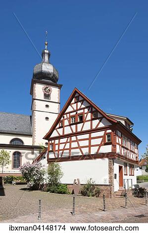 Picture - Parish Church of St. Laurentius and former smithy, Marktheidenfeld, Spessart, Mainfranken, Lower Franconia, Franconia, Bavaria, Germany, Europe. Fotosearch
