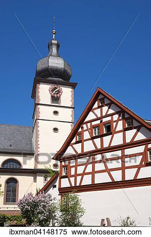 Parish Church of St. Laurentius and former smithy, Marktheidenfeld, Spessart, Mainfranken, Lower Franconia, Franconia, Bavaria, Germany, Europe View Large Photo Image Stock Photography - Parish Church of St. Laurentius and former smithy, Marktheidenfeld, Spessart, Mainfranken, Lower Franconia, Franconia, Bavaria, Germany, Europe. Fotosearch