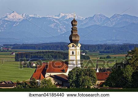 Parish church of the Assumption, the Berchtesgaden Alps with Hochkalter mountain behind, left, Schnaitsee, Chiemgau, Upper Bavaria, Bavaria, Germany, Europe View Large Photo Image Stock Image - Parish church of the Assumption, the Berchtesgaden Alps with Hochkalter mountain behind, left, Schnaitsee, Chiemgau, Upper Bavaria, Bavaria, Germany, Europe. Fotosearch