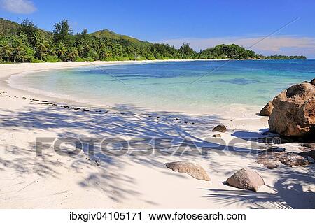 Stock Image - Petite Anse Kerlan beach, Praslin Island, Seychelles, Africa. Fotosearch