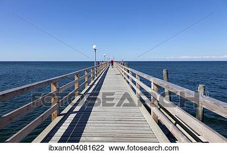 Stock Image - Pier, Ostseebad Wustrow, Baltic Sea resort, Fischland-Darss-Zingst, Mecklenburg-Western Pomerania, Germany, Europe. Fotosearch