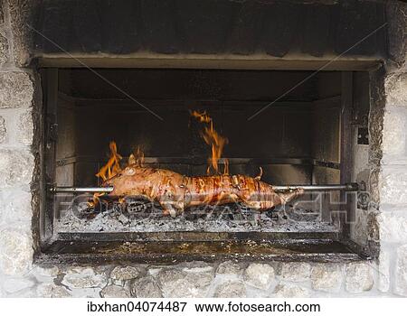 Pigling on spit over the fire, Vucinici, Primorje-Gorski Kotar County, Croatia, Europe View Large Photo Image Stock Photo - Pigling on spit over the fire, Vucinici, Primorje-Gorski Kotar County, Croatia, Europe. Fotosearch