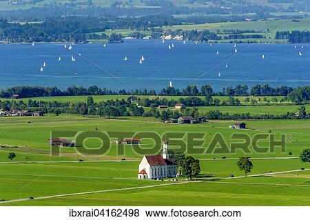 Pilgrimage Church of St. Coloman, lake Forggensee, Schwangau, Schwanengau plain, Konigswinkel, Ostallgau, Allgau, Swabia, Bavaria, Germany, Europe View Large Photo Image Stock Photo - Pilgrimage Church of St. Coloman, lake Forggensee, Schwangau, Schwanengau plain, Konigswinkel, Ostallgau, Allgau, Swabia, Bavaria, Germany, Europe. Fotosearch