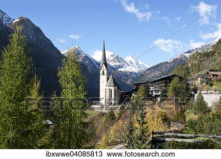 Pilgrimage church of St. Vincent with Mt Grossglockner, village of Heiligenblut am Grossglockner, Molltal valley, High Tauern National Park, Carinthia, Austria, Europe View Large Photo Image Stock Image - Pilgrimage church of St. Vincent with Mt Grossglockner, village of Heiligenblut am Grossglockner, Molltal valley, High Tauern National Park, Carinthia, Austria, Europe. Fotosearch