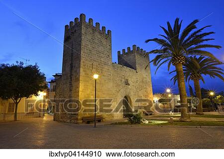 Porta de Moll city gate in the evening, Alcudia, Majorca, Balearic Islands, Spain, Europe View Large Photo Image Stock Image - Porta de Moll city gate in the evening, Alcudia, Majorca, Balearic Islands, Spain, Europe. Fotosearch