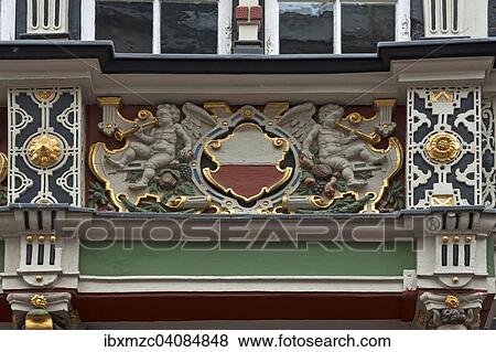 Putti on the wooden balcony of the historic Town Hall, built in 1586, Lubeck, Schleswig-Holstein, Germany, Europe View Large Photo Image Stock Photo - Putti on the wooden balcony of the historic Town Hall, built in 1586, Lubeck, Schleswig-Holstein, Germany, Europe. Fotosearch