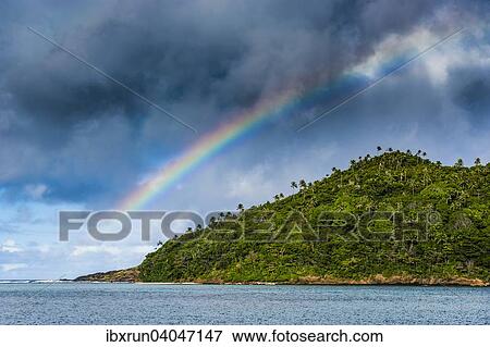 Rainbow above Ofu Island, Manu‘a Group, Samoan Islands, American Samoa, Oceania View Large Photo Image Stock Photo - Rainbow above Ofu Island, Manu‘a Group, Samoan Islands, American Samoa, Oceania. Fotosearch