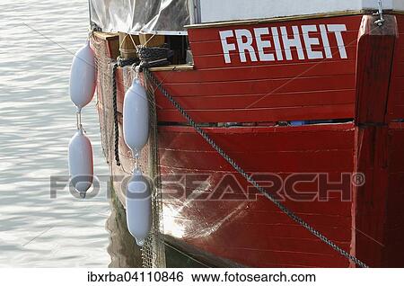 Red bow of the fishing boat named Freiheit, Mecklenburg-Western Pomerania, Germany, Europe View Large Photo Image Stock Photograph - Red bow of the fishing boat named Freiheit, Mecklenburg-Western Pomerania, Germany, Europe. Fotosearch