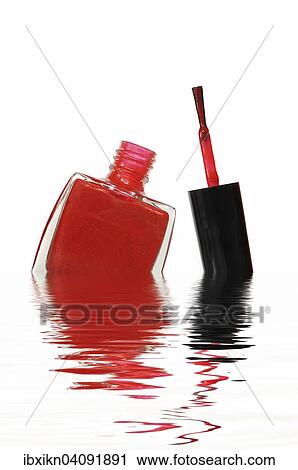 Red nail polish bottle with brush in water View Large Photo Image Stock Image - Red nail polish bottle with brush in water. Fotosearch