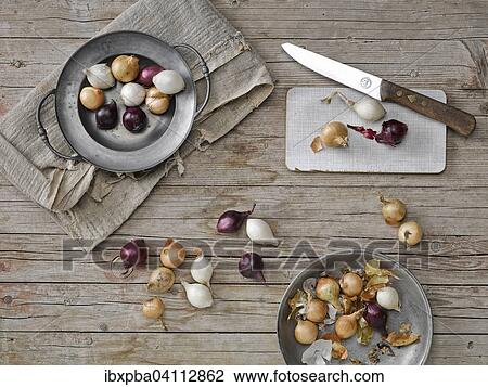 Red, yellow and white onions with knife View Large Photo Image Stock Image - Red, yellow and white onions with knife. Fotosearch