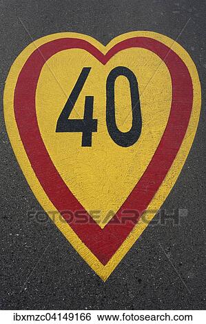 Red-yellow speed limit sign " 40" in heart shape on an asphalt road, Baden-Wurttemberg, Germany, Europe View Large Photo Image Stock Photograph - Red-yellow speed limit sign " 40" in heart shape on an asphalt road, Baden-Wurttemberg, Germany, Europe. Fotosearch