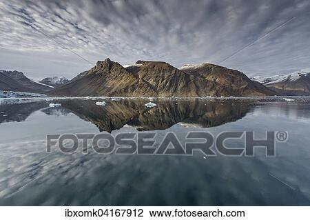 Reflection in the water, mountains and icebergs, Kaiser Franz Josef Fjord, Kejser Franz Josef Fjord, Northeast Greenland National Park, Greenland, North America View Large Photo Image Stock Image - Reflection in the water, mountains and icebergs, Kaiser Franz Josef Fjord, Kejser Franz Josef Fjord, Northeast Greenland National Park, Greenland, North America. Fotosearch