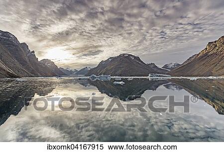Reflection in the water, mountains and icebergs, Kaiser Franz Josef Fjord, Kejser Franz Josef Fjord, Northeast Greenland National Park, Greenland, North America View Large Photo Image Stock Photography - Reflection in the water, mountains and icebergs, Kaiser Franz Josef Fjord, Kejser Franz Josef Fjord, Northeast Greenland National Park, Greenland, North America. Fotosearch
