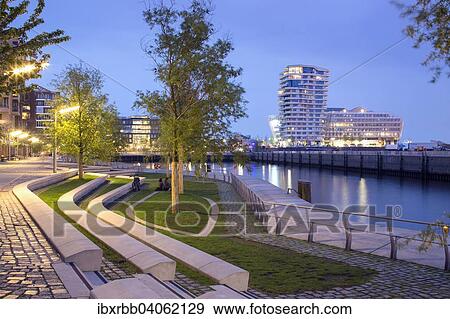 Residential Marco Polo Tower and Unilever-Haus office building, Behnisch and Partner architects, Quartier Strandkai, HafenCity, Hamburg, Germany, Europe View Large Photo Image Stock Photo - Residential Marco Polo Tower and Unilever-Haus office building, Behnisch and Partner architects, Quartier Strandkai, HafenCity, Hamburg, Germany, Europe. Fotosearch