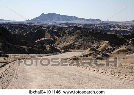 Road through the moon landscape near Swakopmund, Namib Naukluft Park, Namibia, Africa View Large Photo Image Stock Photograph - Road through the moon landscape near Swakopmund, Namib Naukluft Park, Namibia, Africa. Fotosearch