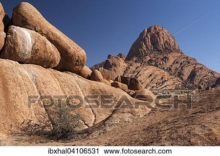 Rock formations and boulders at Spitzkoppe, Damaraland, Namibia, Africa View Large Photo Image Stock Image - Rock formations and boulders at Spitzkoppe, Damaraland, Namibia, Africa. Fotosearch
