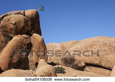 Rock formations and boulders at Spitzkoppe, Damaraland, Namibia, Africa View Large Photo Image Stock Photograph - Rock formations and boulders at Spitzkoppe, Damaraland, Namibia, Africa. Fotosearch