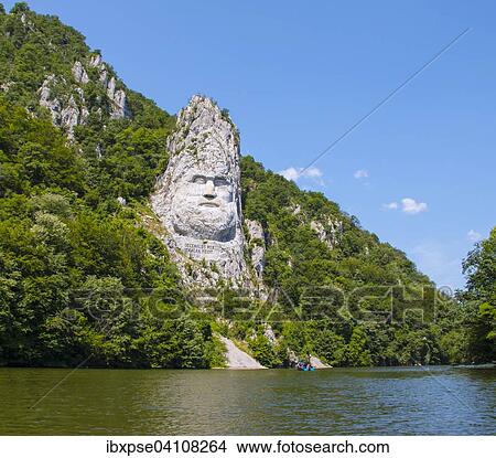 Rock sculpture of Decebalus, Iron Gates Natural Park, Danube, Romania, Europe View Large Photo Image Picture - Rock sculpture of Decebalus, Iron Gates Natural Park, Danube, Romania, Europe. Fotosearch