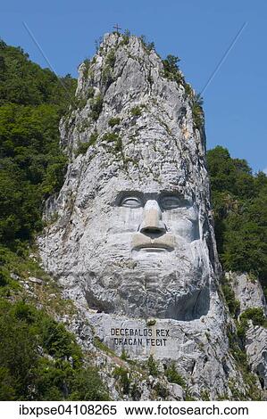 Rock sculpture of Decebalus, Iron Gates Natural Park, Danube, Romania, Europe View Large Photo Image Stock Photography - Rock sculpture of Decebalus, Iron Gates Natural Park, Danube, Romania, Europe. Fotosearch