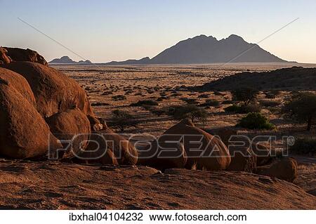 Rocks at Spitzkoppe, little Spitzkoppe behind, evening light, Namibia, Africa View Large Photo Image Stock Image - Rocks at Spitzkoppe, little Spitzkoppe behind, evening light, Namibia, Africa. Fotosearch