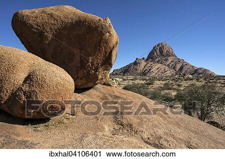 Rocks in the Spitzkoppe area, Great Spitzkoppe behind, Damaraland, Namibia, Africa View Large Photo Image Stock Image - Rocks in the Spitzkoppe area, Great Spitzkoppe behind, Damaraland, Namibia, Africa. Fotosearch