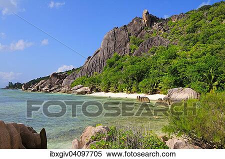 Rocky coast with tropical vegetation, La Digue Island, La Digue and Inner Islands, Seychelles, Africa View Large Photo Image Stock Photography - Rocky coast with tropical vegetation, La Digue Island, La Digue and Inner Islands, Seychelles, Africa. Fotosearch