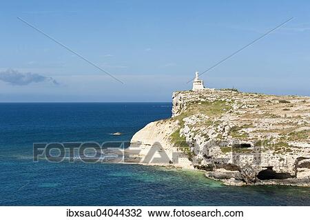 Rocky small island with monument, St. Paul's Islands, Il-Gzejjer ta 'San Pawl, Malta, Europe View Large Photo Image Stock Image - Rocky small island with monument, St. Paul's Islands, Il-Gzejjer ta 'San Pawl, Malta, Europe. Fotosearch