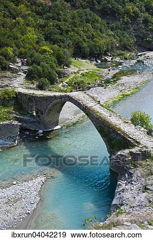 Stock Photo - Roman bridge of Benja across river Shkumbin, Balkan, Albania, Europe. Fotosearch