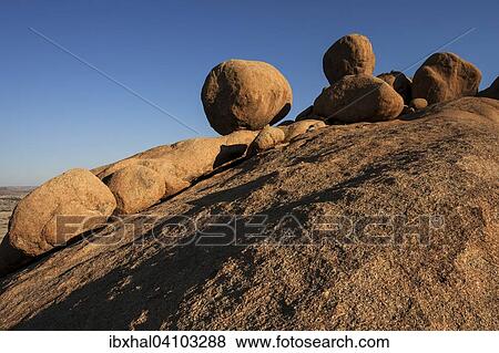 Stock Photo - Round rocks in the evening light, Bushman Paradise, Spitzkoppe, Namibia, Africa. Fotosearch