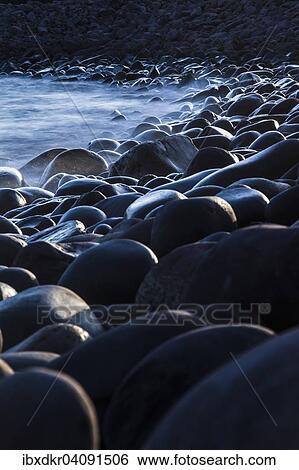 Round stones on Minard Beach, Minard Head, Dingle Bay, Dingle Peninsula, County Kerry, Ireland, Europe View Large Photo Image Stock Photograph - Round stones on Minard Beach, Minard Head, Dingle Bay, Dingle Peninsula, County Kerry, Ireland, Europe. Fotosearch