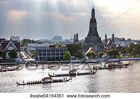 Royal barge procession on the Mae Nam Chao Phraya, Wat Arun, Temple of Dawn, Bangkok, Thailand, Asia View Large Photo Image Stock Image - Royal barge procession on the Mae Nam Chao Phraya, Wat Arun, Temple of Dawn, Bangkok, Thailand, Asia. Fotosearch