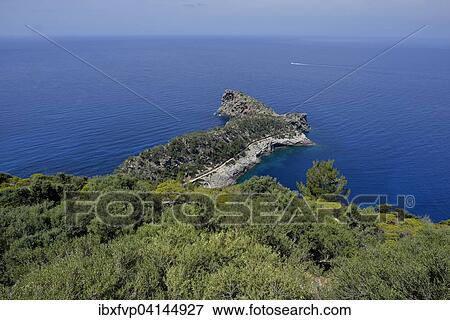 Stock Photo - Sa Foradada peninsula with rock hole, between Deia and Valldemossa, Majorca, Balearic Islands, Spain, Europe. Fotosearch