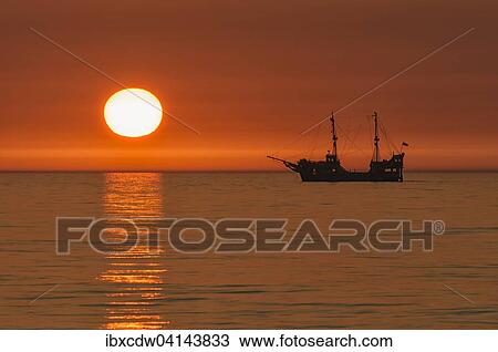 Sailboat in the sunset, Baltic Sea, Gdansk, Pomerania Province, Poland, Europe View Large Photo Image Stock Image - Sailboat in the sunset, Baltic Sea, Gdansk, Pomerania Province, Poland, Europe. Fotosearch