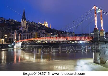 Saint Georges Footbridge, Saint John Cathedral and Basilica of Notre-Dame de Fourviere at night, Lyon, Rhone-Alpes, France, Europe View Large Photo Image Stock Photography - Saint Georges Footbridge, Saint John Cathedral and Basilica of Notre-Dame de Fourviere at night, Lyon, Rhone-Alpes, France, Europe. Fotosearch