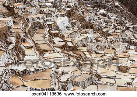 Stock Photograph - Salt pans in the Sacred Valley of the Incas on the Urubamba, at Maras, Peru, South America. Fotosearch