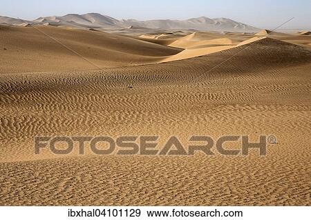 Sand dunes between Swakopmund and Walvis Bay on road B2, Namibia, Africa View Large Photo Image Stock Photo - Sand dunes between Swakopmund and Walvis Bay on road B2, Namibia, Africa. Fotosearch