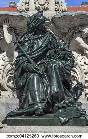 Sculpture of Alma Mater with the symbols of science at the Pauli Fountain from 1889, Erlangen, Middle Franconia, Bavaria, Germany, Europe View Large Photo Image Stock Image - Sculpture of Alma Mater with the symbols of science at the Pauli Fountain from 1889, Erlangen, Middle Franconia, Bavaria, Germany, Europe. Fotosearch