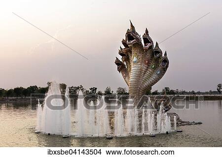 Seven-headed Naga serpent and fountain in front of the Elephant Temple Thep Wittayakhom Vihara, Wittayakom, dusk, Wat Baan Rai, Korat, Nakhon Ratchasima Province, Isaan, Isan, Thailand, Asia View Large Photo Image Picture - Seven-headed Naga serpent and fountain in front of the Elephant Temple Thep Wittayakhom Vihara, Wittayakom, dusk, Wat Baan Rai, Korat, Nakhon Ratchasima Province, Isaan, Isan, Thailand, Asia. Fotosearch