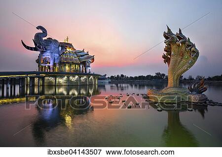 Seven-headed Naga serpent in front of the Elephant Temple Thep Wittayakhom Vihara, Wittayakom, dusk, Wat Baan Rai, Korat, Nakhon Ratchasima Province, Isaan, Isan, Thailand, Asia View Large Photo Image Stock Photo - Seven-headed Naga serpent in front of the Elephant Temple Thep Wittayakhom Vihara, Wittayakom, dusk, Wat Baan Rai, Korat, Nakhon Ratchasima Province, Isaan, Isan, Thailand, Asia. Fotosearch