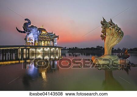 Seven-headed Naga serpent in front of the Elephant Temple Thep Wittayakhom Vihara, Wittayakom, dusk, Wat Baan Rai, Korat, Nakhon Ratchasima Province, Isaan, Isan, Thailand, Asia View Large Photo Image Stock Photo - Seven-headed Naga serpent in front of the Elephant Temple Thep Wittayakhom Vihara, Wittayakom, dusk, Wat Baan Rai, Korat, Nakhon Ratchasima Province, Isaan, Isan, Thailand, Asia. Fotosearch