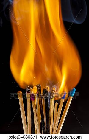 Stock Image - Several matches are lit at the same time. Fotosearch