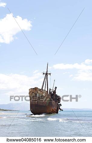Stock Photograph - Shipwreck on the sandy beach, near Gytheio, Peloponnese, Greece, Europe. Fotosearch